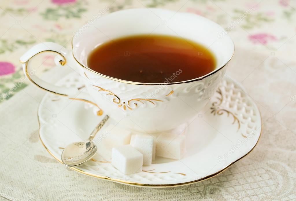 Gourmet tea cup with sugar cubes