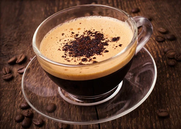 Coffee with foam in glass cup — Stock Photo, Image