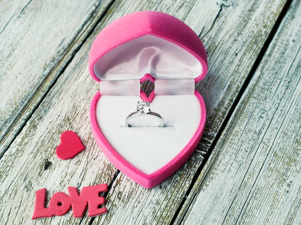 Ring with diamond in heart shaped box — Stock Photo, Image