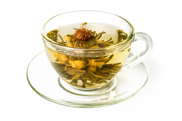 Blooming tea in glass cup — Stock Photo, Image