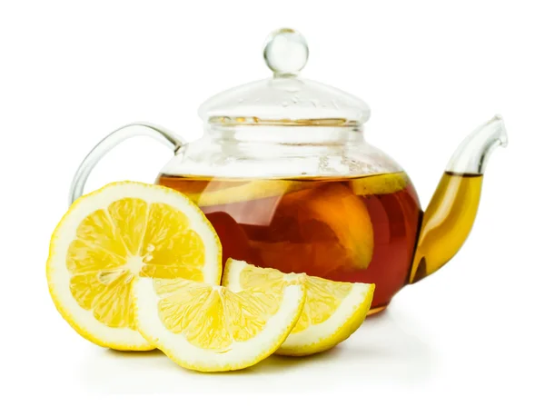 Lemon tea in glass teapot — Stock Photo, Image