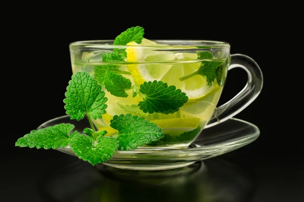 Lemonade with ice and mint in a glass cup — Stock Photo, Image