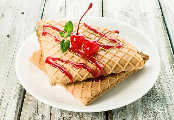 Waffles with cherry topping — Stock Photo, Image