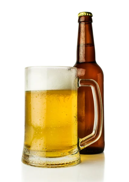 Mug of beer and a bottle — Stock Photo, Image