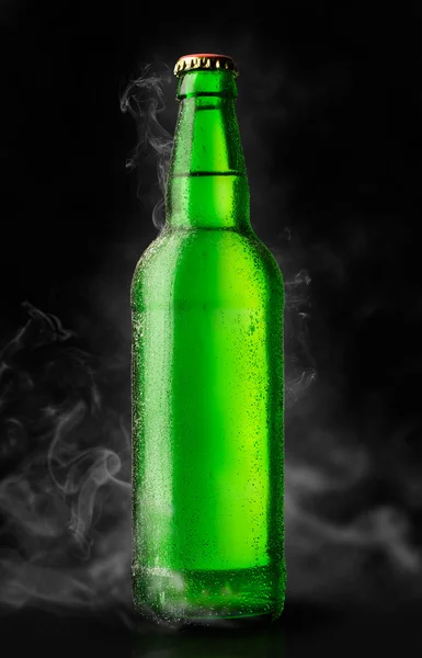 Green bottle of chilled beer — Stock Photo, Image