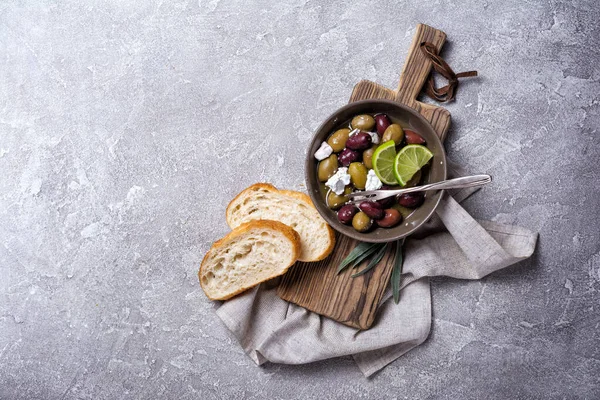Top View Tasty Olives Mix Feta Cheese Slices Lime Bread — Stock Photo, Image
