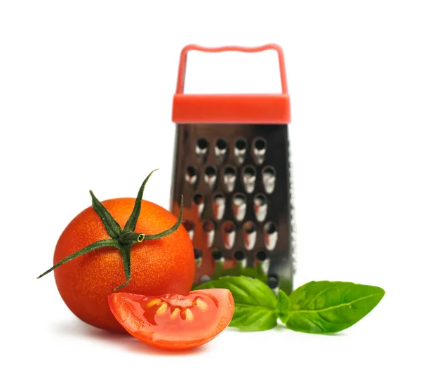 Tomates cherry con albahaca y un pequeño rallador —  Fotos de Stock