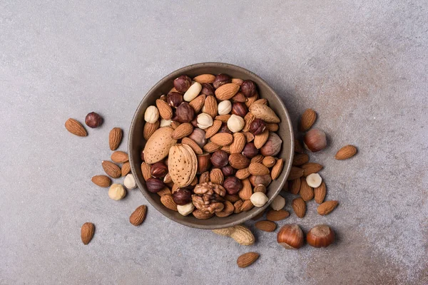 Top View Bowl Almond Hazelnut Walnut Peanut Nuts Grey Concrete — Stock Photo, Image