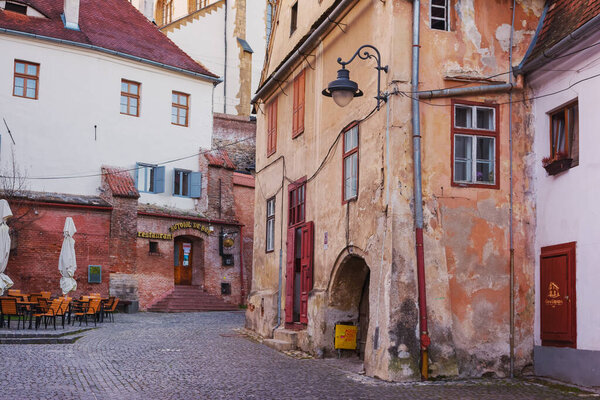 Sibiu, Transylvania, Romania - April 24, 2022: cityscape with beautiful old buildings in historical center