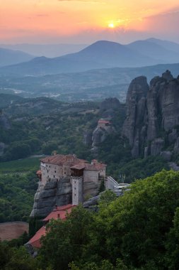Beautiful sunset landscape with amazing monasteries of Meteora, Greece