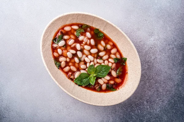 Top View Spicy Dish Beans Tomato Sauce Fresh Basil Grey — Stock Photo, Image