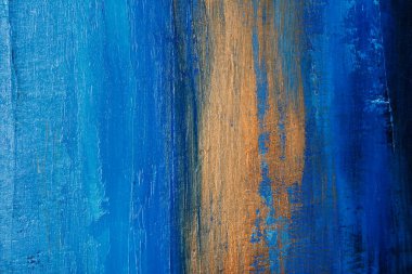 Mavi ve altın el vuruşlarıyla soyut akrilik resim arkaplanı