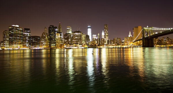 Manhattan bridge and skyline at night