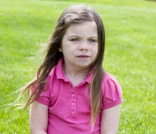 Little girl on grass — Stock Photo, Image