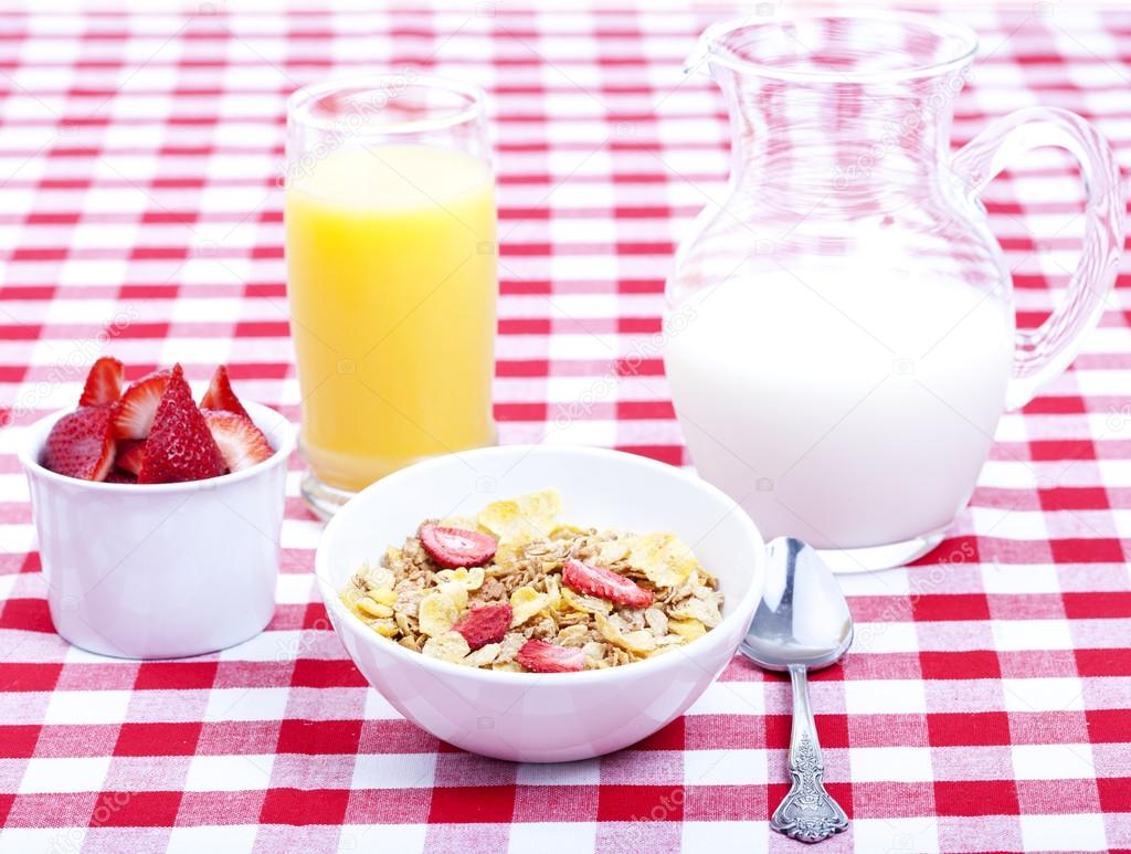 Breakfast of cereal, fruit, orange juice and milk ⬇ Stock Photo, Image