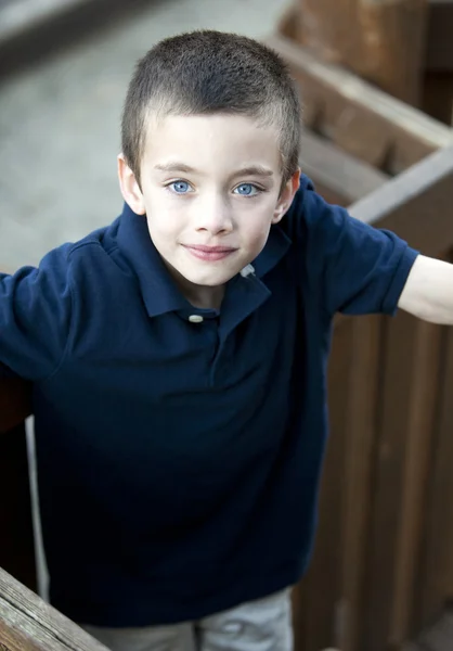 Handsome young boy portrait in a park — Stock Photo, Image