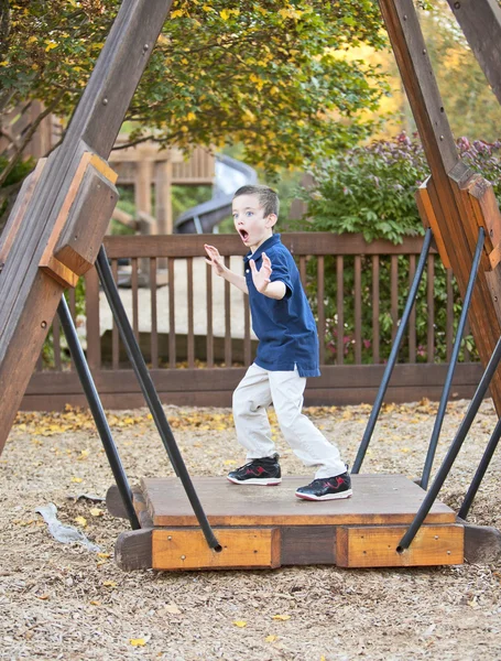 Young boy being silly at the park — Stock Photo, Image