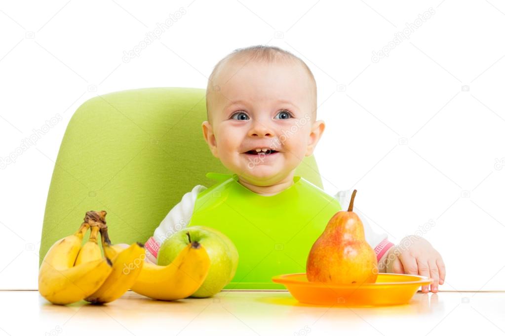 Happy baby eating fruits — Stock Photo © oksun70 25480145
