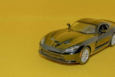 Sports car on a yellow background. Car mockup for designers