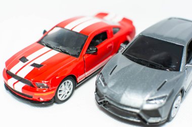 Two sports cars in salon. Nice auto. Need for speed