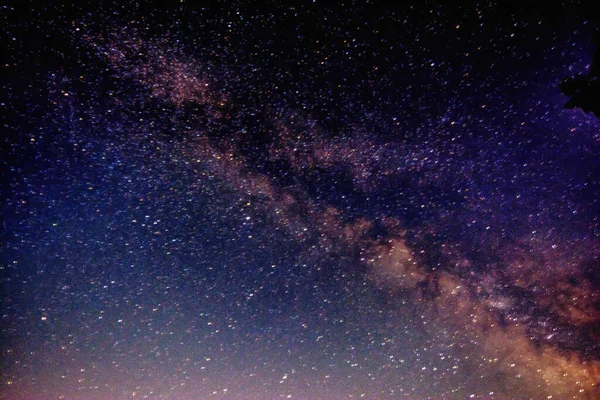 Starry sky and bright milky way galaxy. Beautiful night landscape