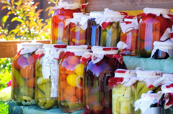 Shelves with canned fruit and vegetable Stock Picture