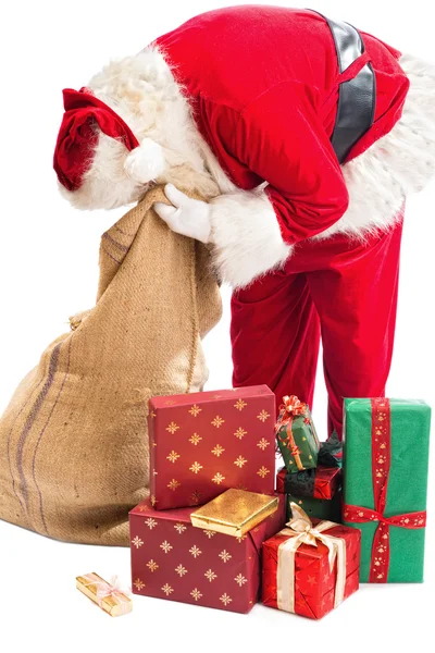 Santa claus hledáte dárek — Stock fotografie