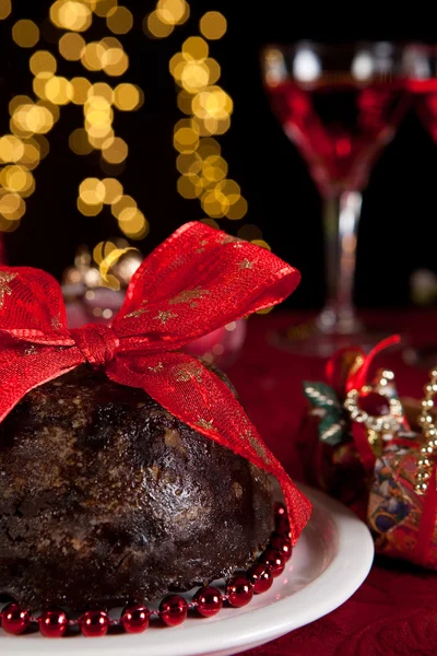 Plum pudding and christmas tree — Stock Photo, Image