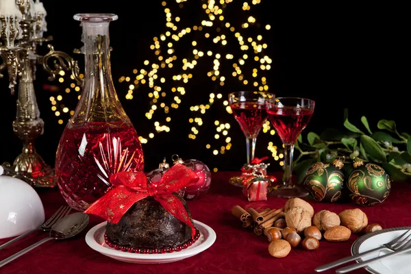 Christmas table with plum pudding — Stock Photo, Image