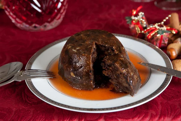 Plum pudding with brandy — Stock Photo, Image