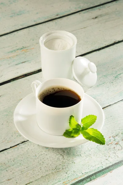 Pot of stevia sweetener and coffee — Stock Photo, Image