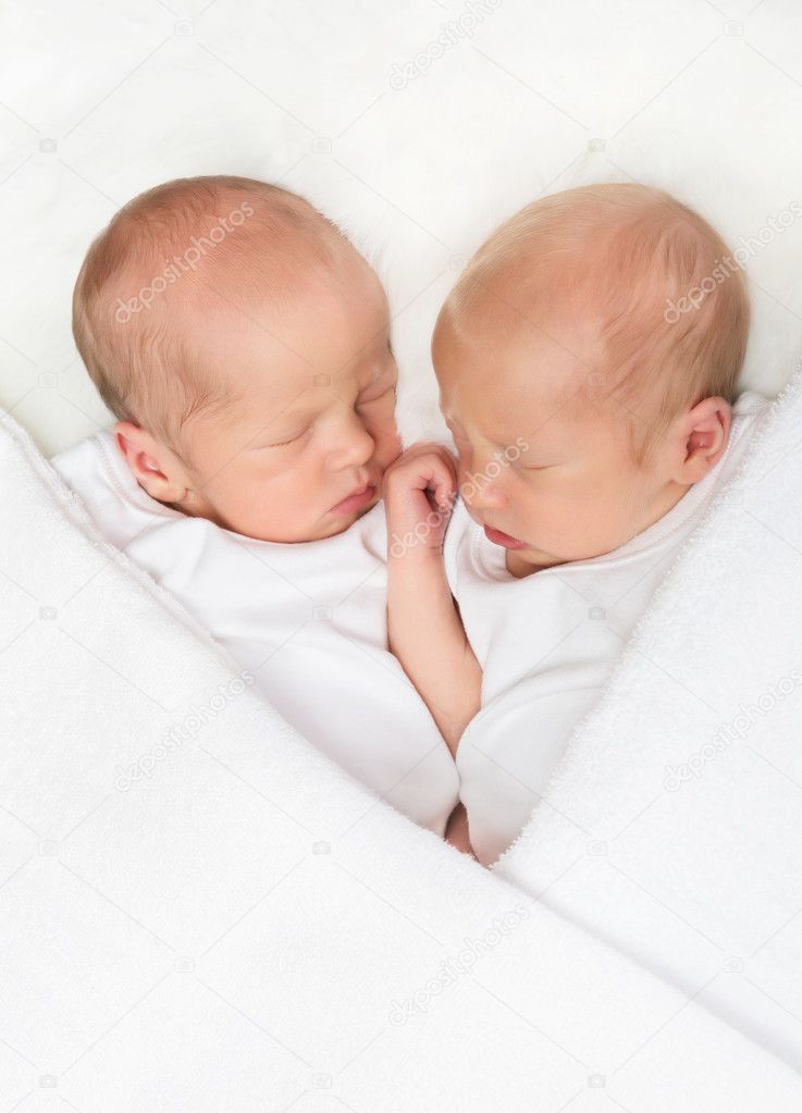 Sleeping twin babies