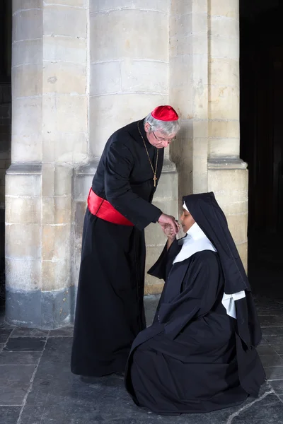 Nun kissing ring cardinal — Stock Photo, Image