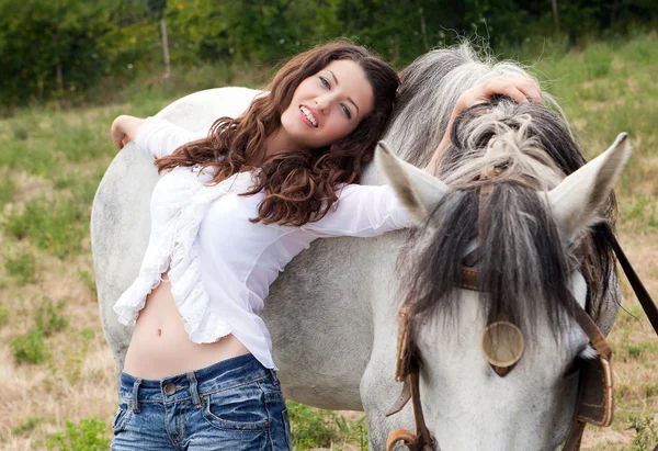 Beautiful woman with horse — Stock Photo, Image