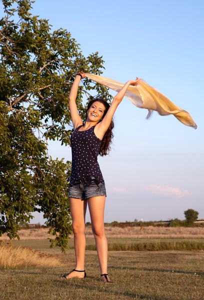 Šťastná žena ve větru — Stock fotografie