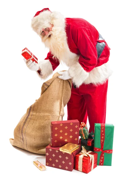 Santa claus gevonden zijn geschenk — Stockfoto