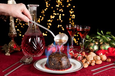 Flames on the christmas pudding clipart