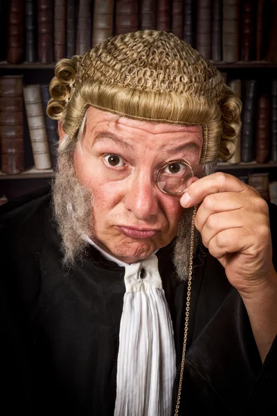 Judge with monocle — Stock Photo, Image