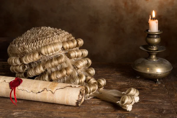 Parchment scroll and judge's wig — Stock Photo, Image