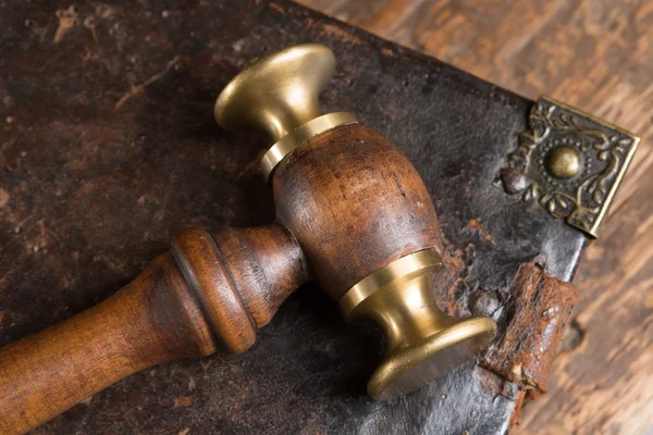 Judge's hammer and old book — Stock Photo, Image