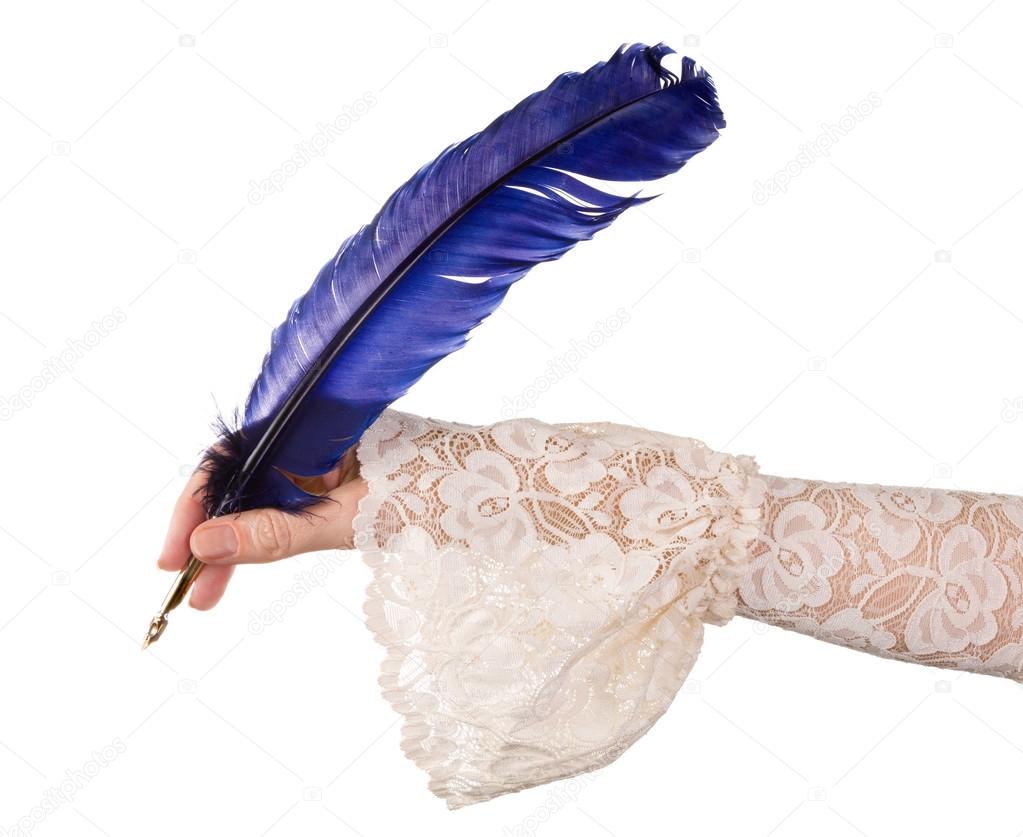 Hand with blue quill feather