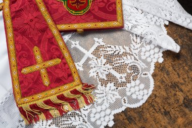 Chalice veil and red maniple clipart