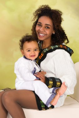 Ethiopian mother with baby clipart