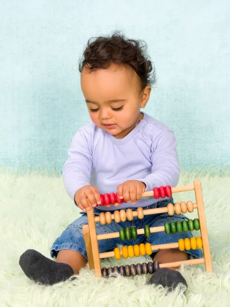 Baby with abacus — Stock Photo, Image