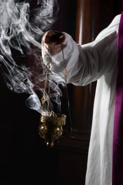 Incense burning in church clipart
