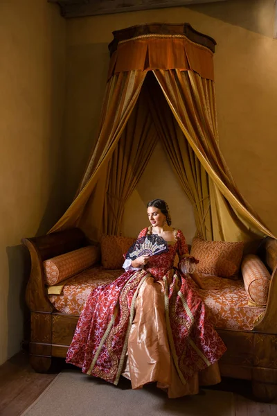 Renaissance Lady Late Medieval Gown Sitting Beautiful Canopy Bed Her — Stok fotoğraf