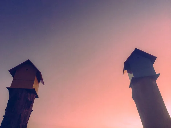 Two Bird Nests Bird Houses Sunset Dramatic Sky Wooden Pole — Stock Photo, Image