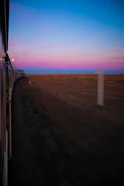 Vertical Shot Train Ride Desert Motion Blur Dramatic Sunset — ストック写真