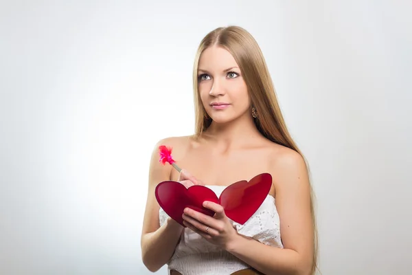 Woman holding Valentines Day heart sign — Stock Photo, Image