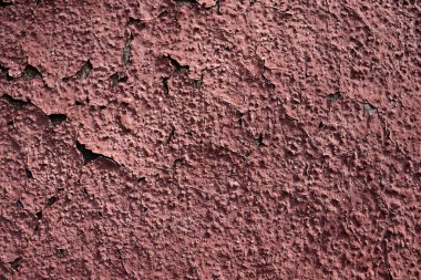 Old crack wall background with dry paint. Abstract vintage texture